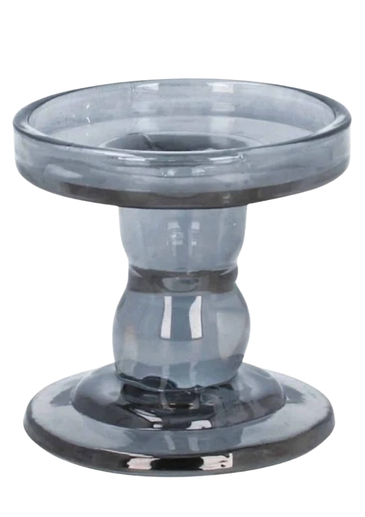 Elevate your pillar candles with this elegant Grey Glass Pillar Candle Holder by Gisela Graham. The sleek, translucent grey glass gently diffuses candlelight, adding a warm ambient glow to any room. Perfect for showcasing your favourite pillar candles on a mantelpiece, side table, or centrepiece, this refined holder combines subtle sophistication with timeless craftsmanship, making it a thoughtful gift for any occasion.